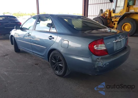 2002 Toyota Camry Xle z USA, uszkodzony, nr VIN 4T1BE32K32U542971